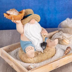 Deko-Figur, Wichtel mit Seestern, 15,8cm x 13,2cm x 17cm