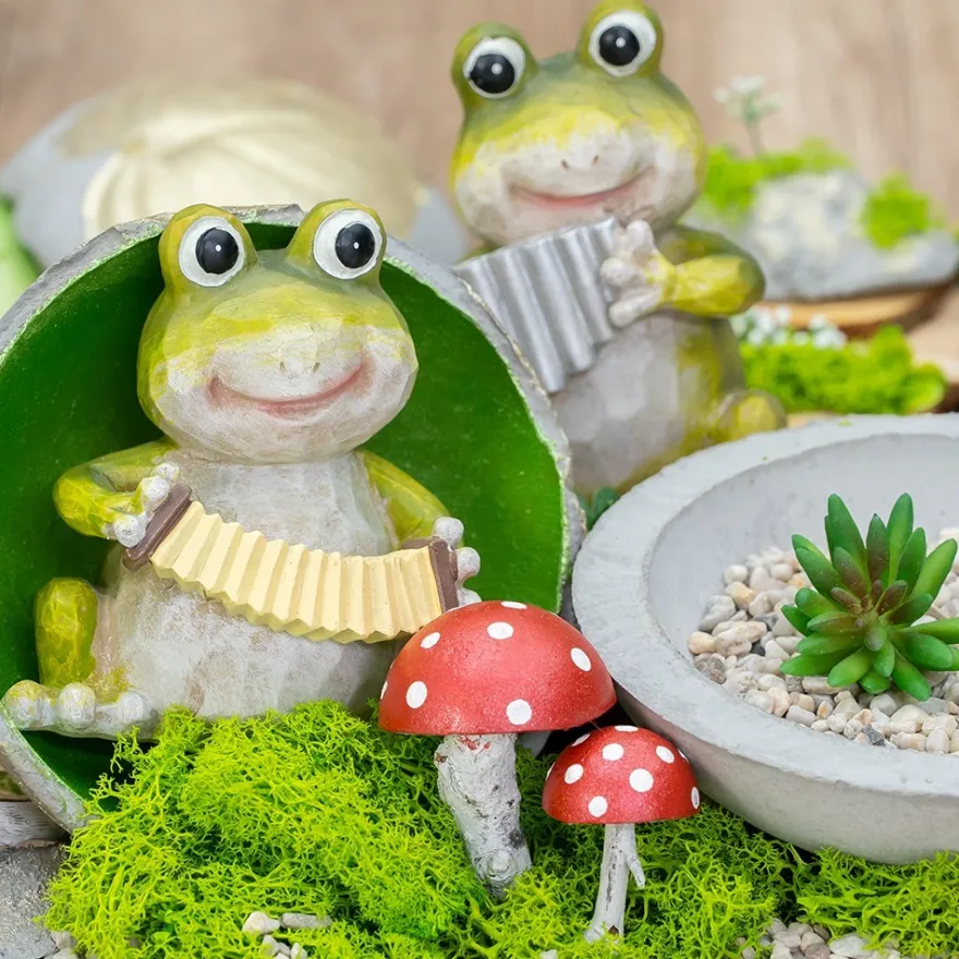 Deko-Frosch mit Panflöte, 13,5cm hoch, 11cm breit