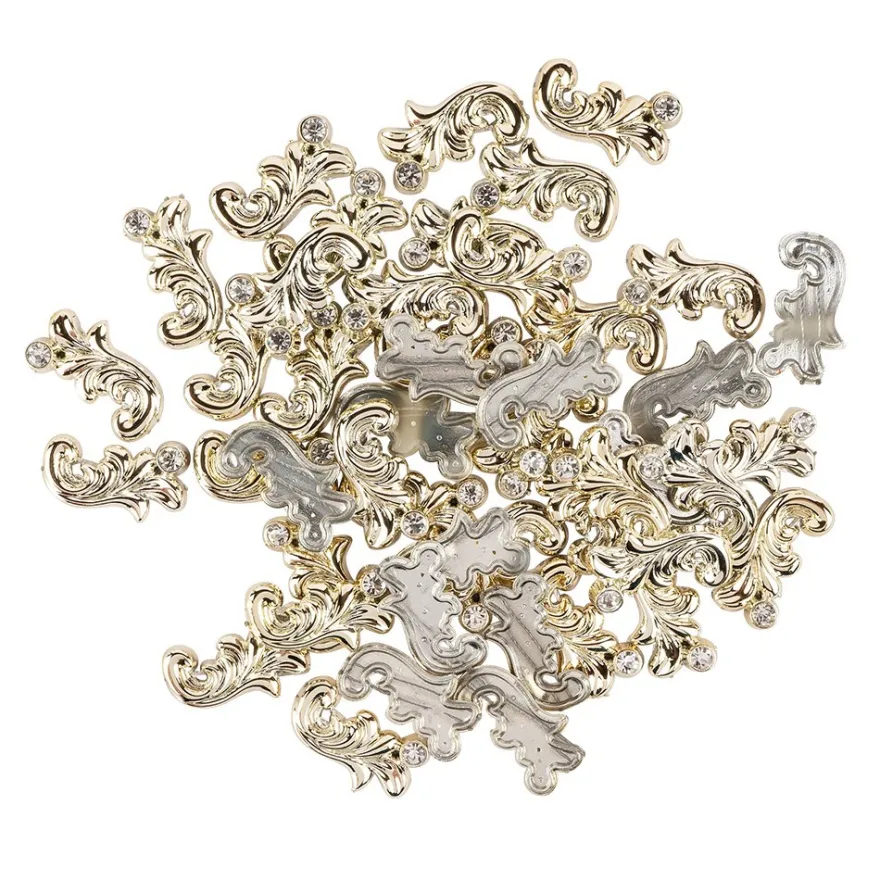Premium-Schmucksteine, Ranken-Ornament, 1,1cm x 2cm x 0,3cm, hellgold, mit Glaskristallen, 45 Stück